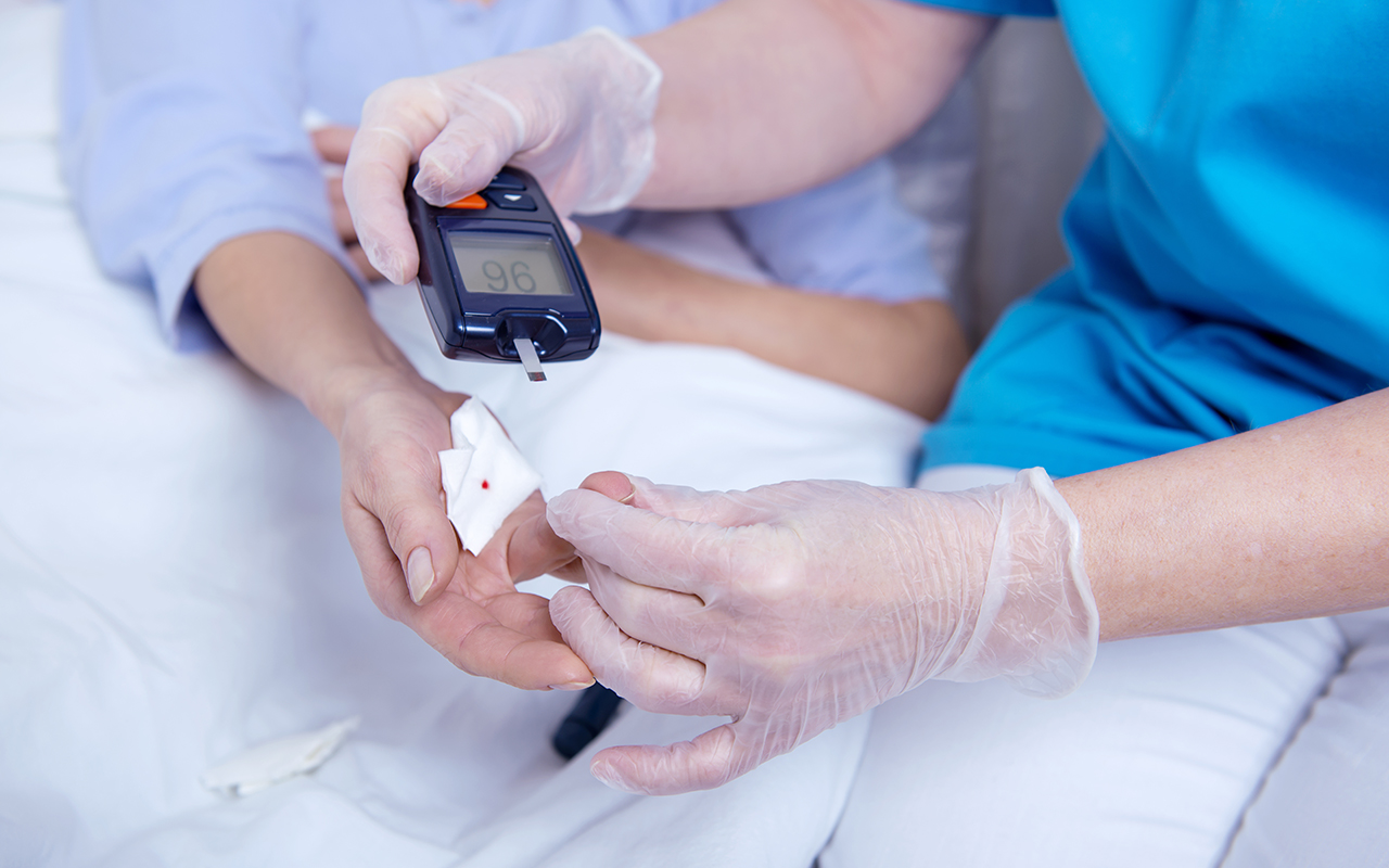 measuring of blood sugar for diabetes patient